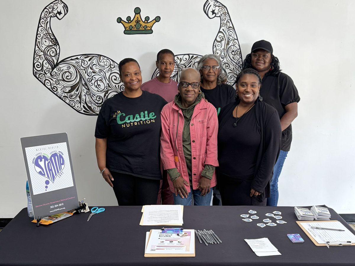 Group photo at the STAMP Love table during Stamping Out the Stigma: A Community Conversation, October 10, 2026